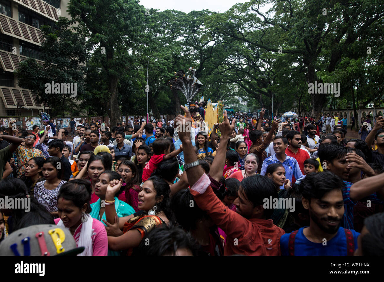 DHAKA, BANGLADESH - AUGUST 23 : Hindu devotees parade as they take part in the celebrations of Janmashtami, a festival marking the birth of Hindu deit Stock Photo