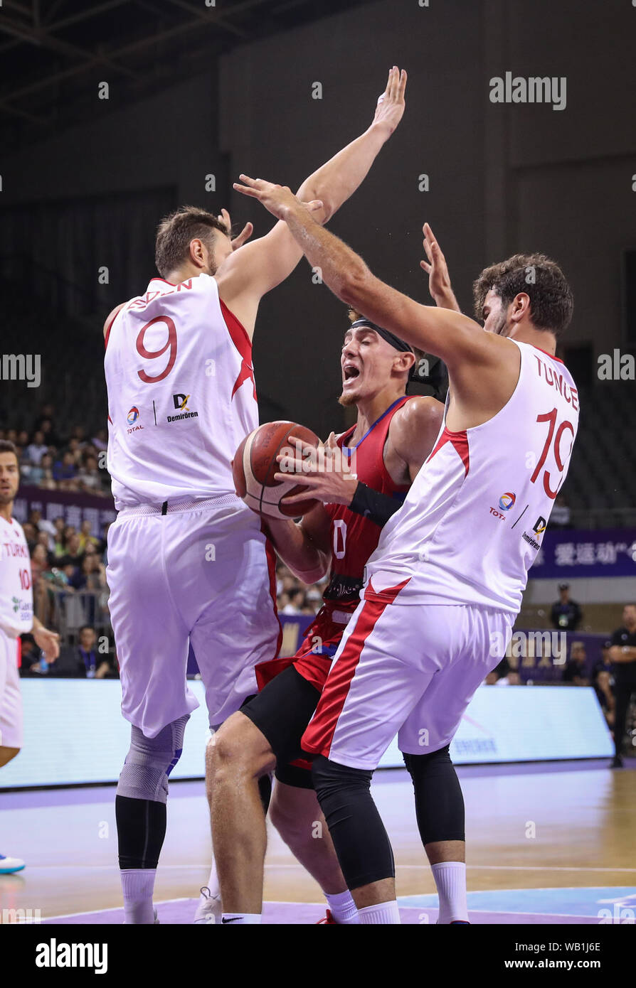 Suzhou, China's Jiangsu Province. 23rd Aug, 2019. Puerto Rico's Isaiah Pineiro (C) drives the ball during a match against Turkey at the 2019 Suzhou International Basketball Challenge and Culture Week in Suzhou, east China's Jiangsu Province, Aug. 23, 2019. Credit: Yang Lei/Xinhua/Alamy Live News Stock Photo