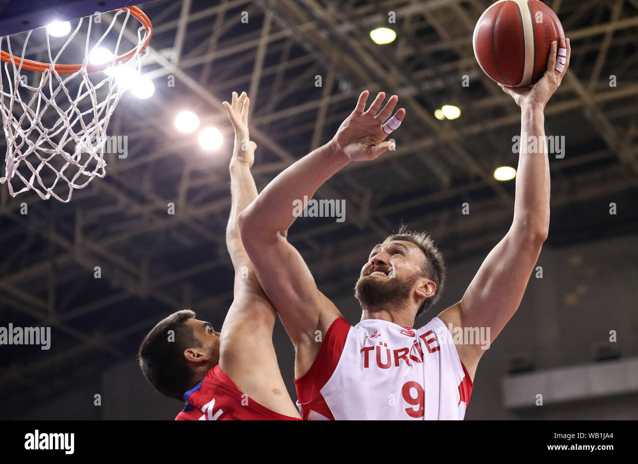 Suzhou, China's Jiangsu Province. 23rd Aug, 2019. Turkey's Semih Erden (R) goes for the basket during a match against Puerto Rico at the 2019 Suzhou International Basketball Challenge and Culture Week in Suzhou, east China's Jiangsu Province, Aug. 23, 2019. Credit: Yang Lei/Xinhua/Alamy Live News Stock Photo