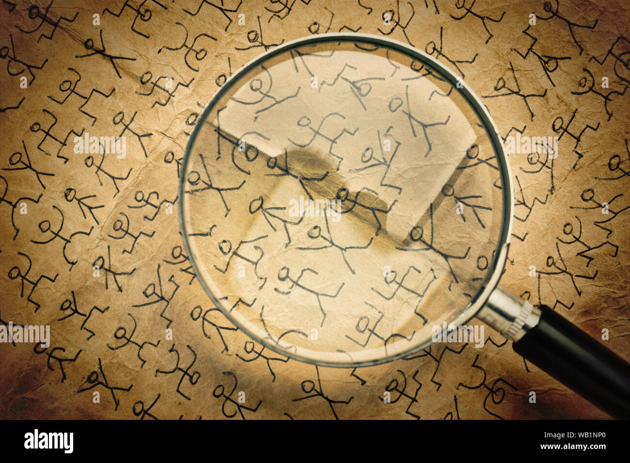 Magnifying glass and secret code dancing men Stock Photo - Alamy