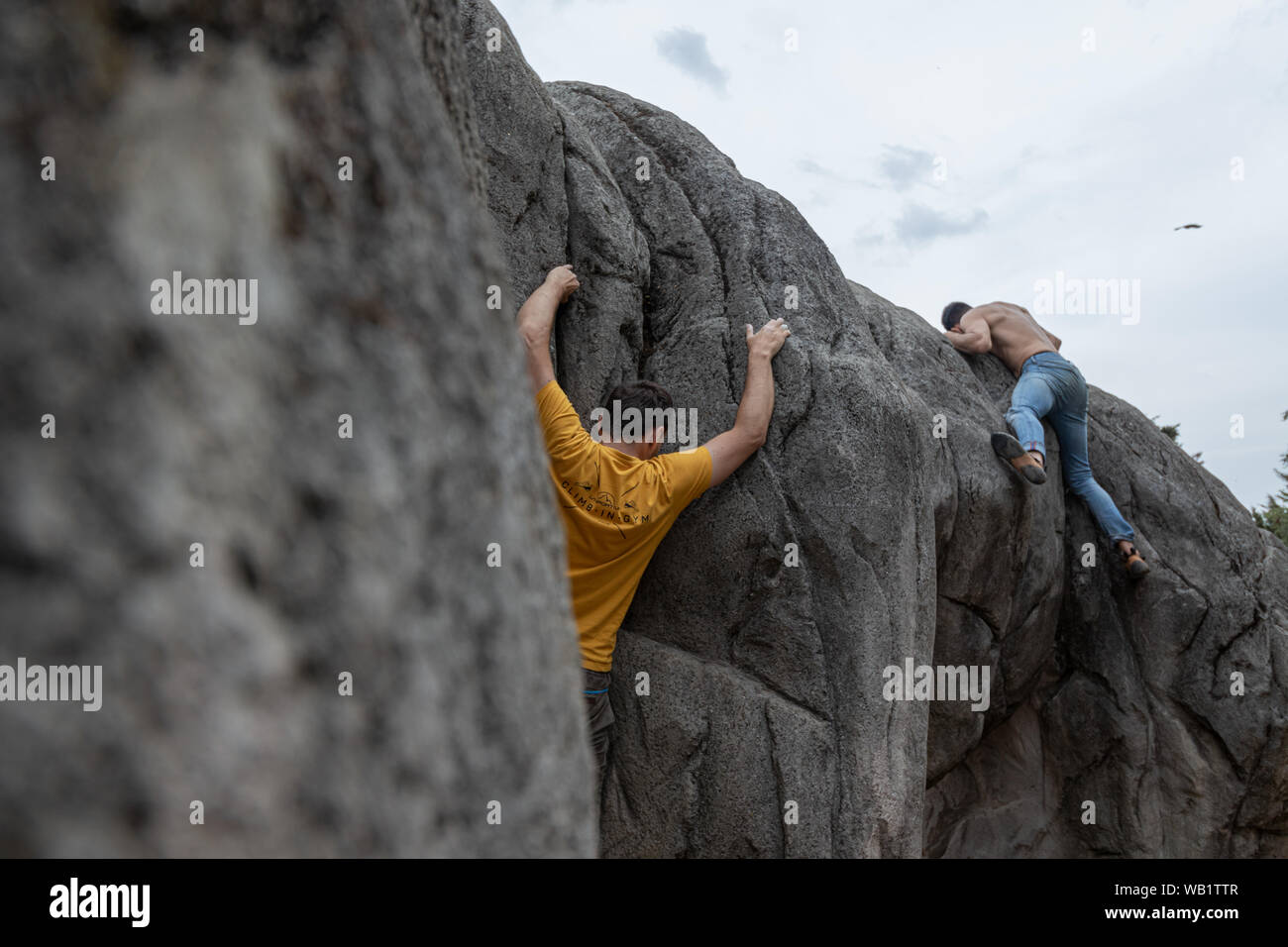 two men rock climbing Stock Photo