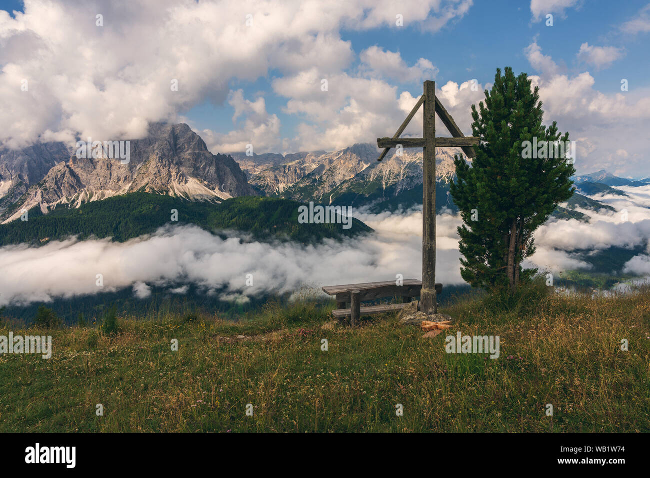 Dolomites above the clouds, Sesto South Tyrol Stock Photo