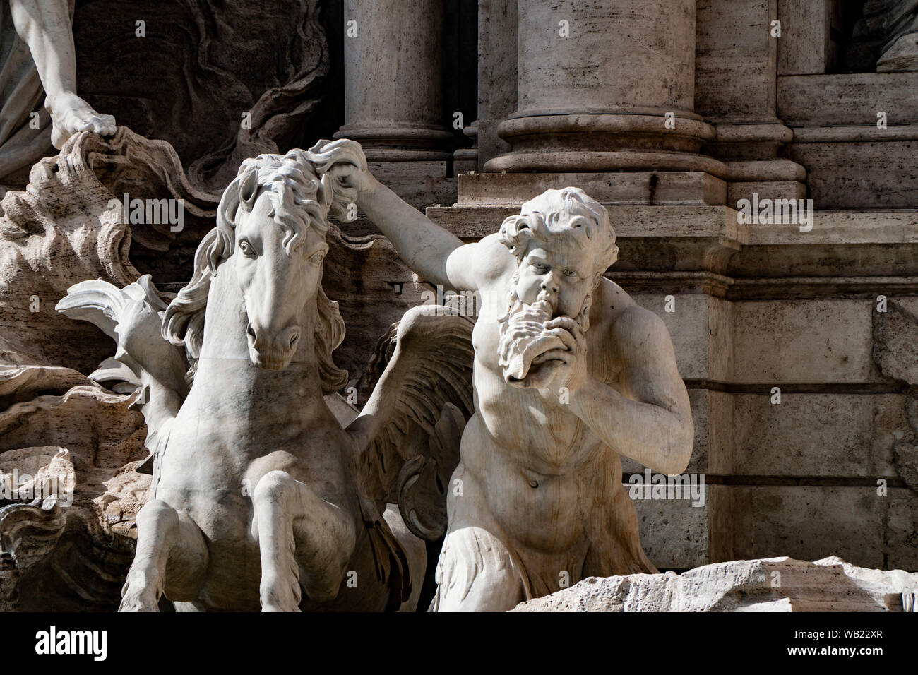 Fragment of Trevi Fountain (Fontana di Trevi) by architect Nicola Salvi Stock Photo