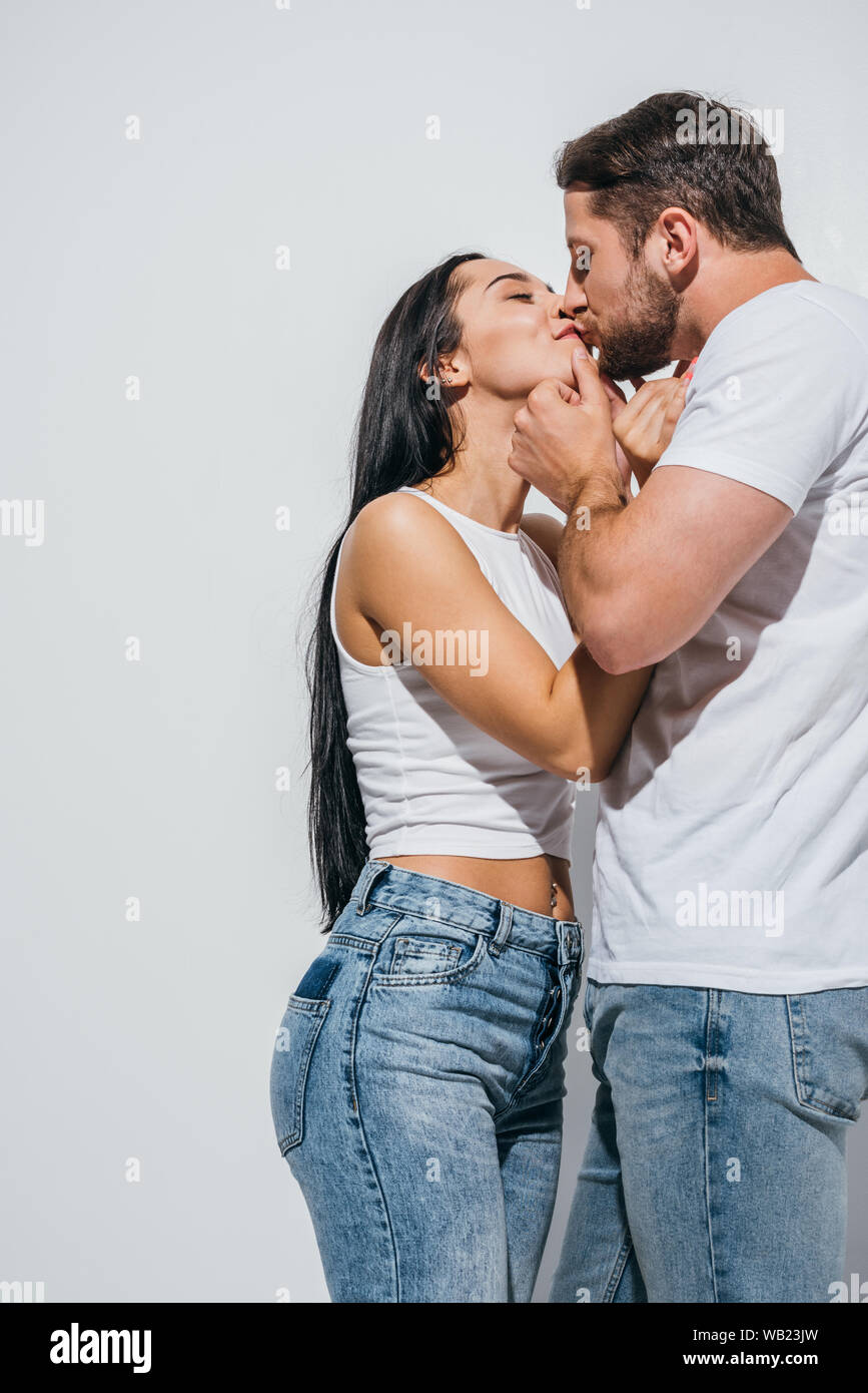 Young couple in love kissing hi-res stock photography and images - Alamy