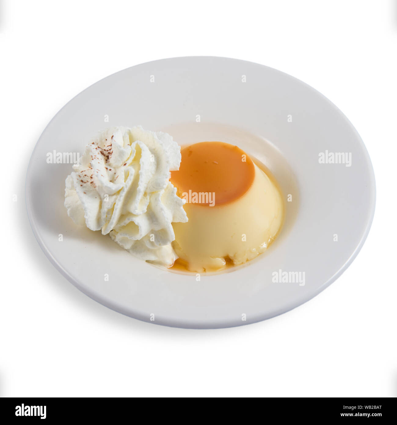 https://c8.alamy.com/comp/WB2BAT/dessert-of-flan-with-cream-WB2BAT.jpg