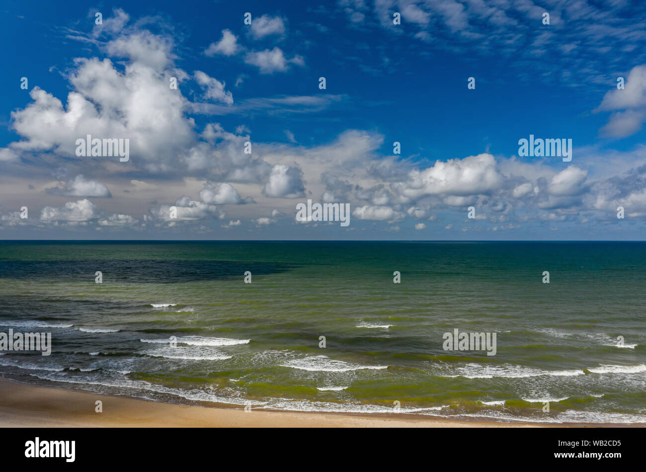 Beautiful view of the sea. Cloudy day. Blue sky. Sand beach Stock Photo ...