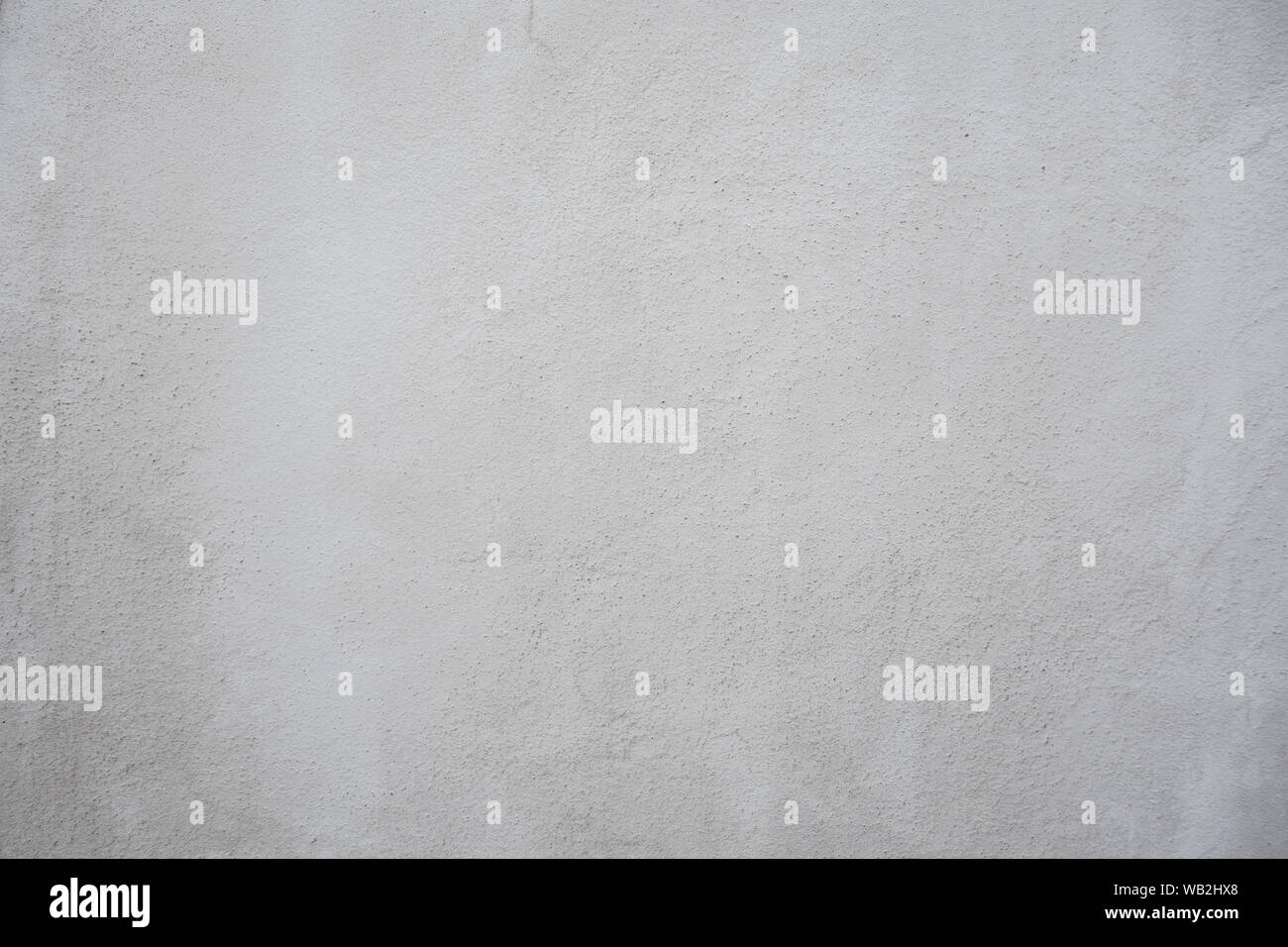 Blank white and gray plaster wall background texture. Stock Photo