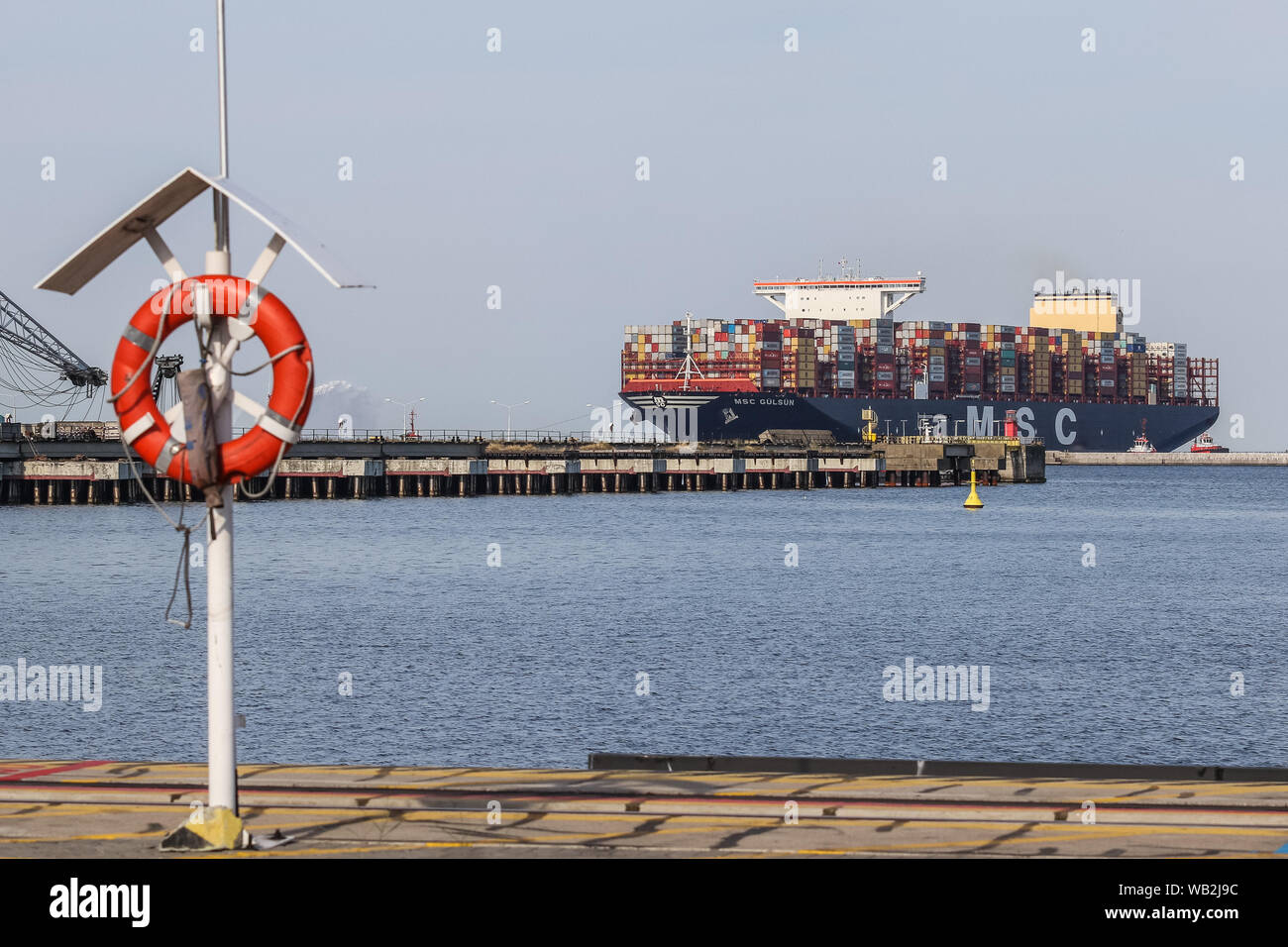 Gdansk, Poland. 23rd, August 2019  MSC Gulsun, current the world's largest container ship (23,756 TEU) entering Deepwater Container Terminal (DCT) is seen. MSC Gulsun sailing under the flag of Panama, was built in 2019 and is 399.9 m long and 61.5 m width   © Vadim Pacajev / Alamy Live News Stock Photo