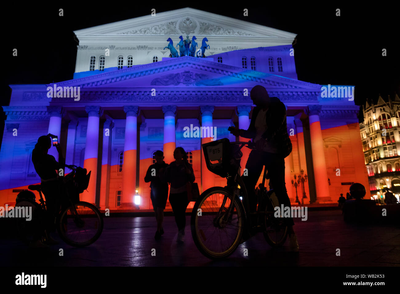 A facade of the Bolshoi theatre of Russia in the colors of the Russian tricolor during the holiday of the Flag Of Russia in the center of Moscow, Russ Stock Photo