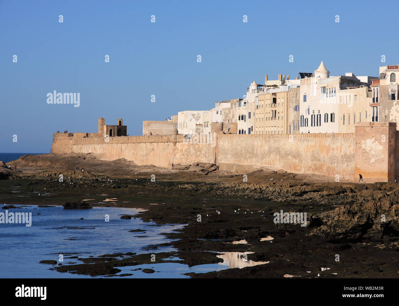 Morocco, Essaouira. Panoramic view of the old Kasbah and sea wall viewed from the Skala guarding the historical port - UNESCO World Heritage Site Stock Photo