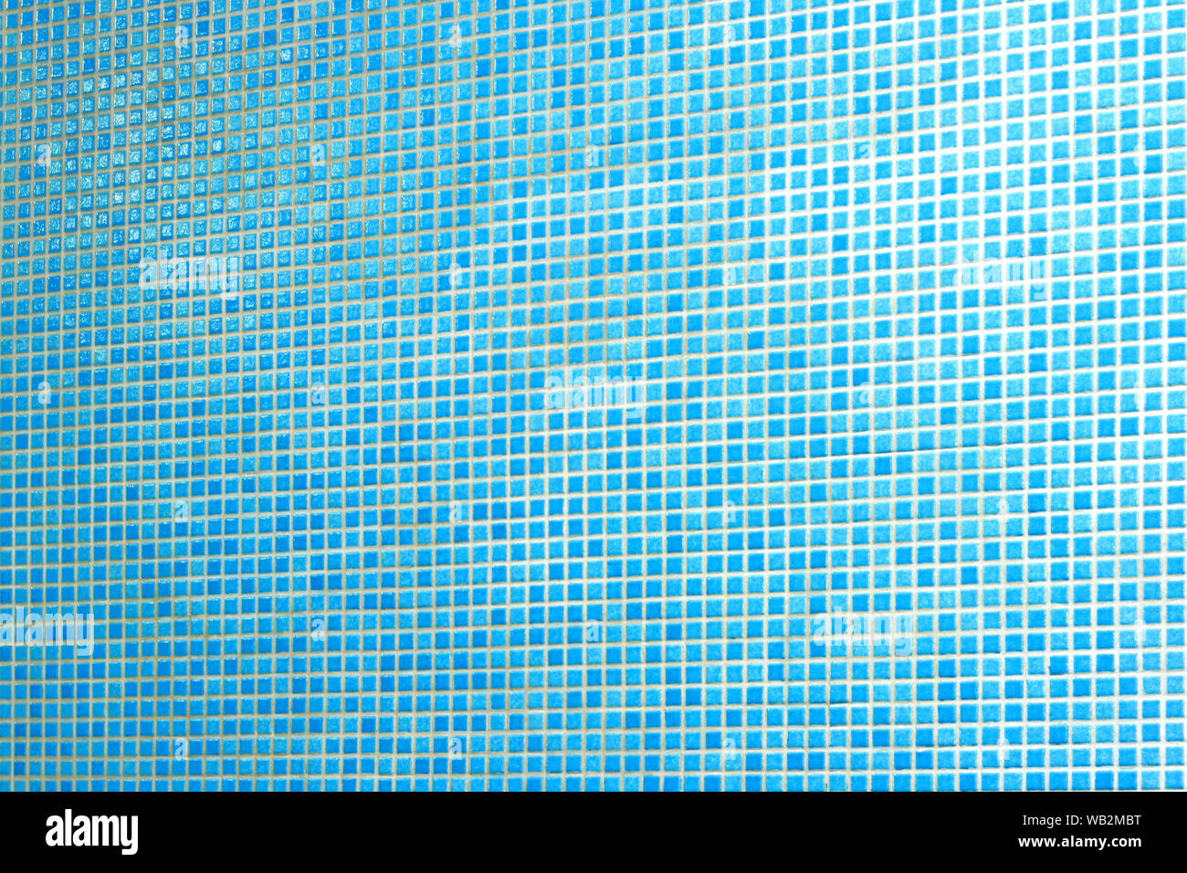 Blue tiles mosaic background of swimming pool Stock Photo - Alamy