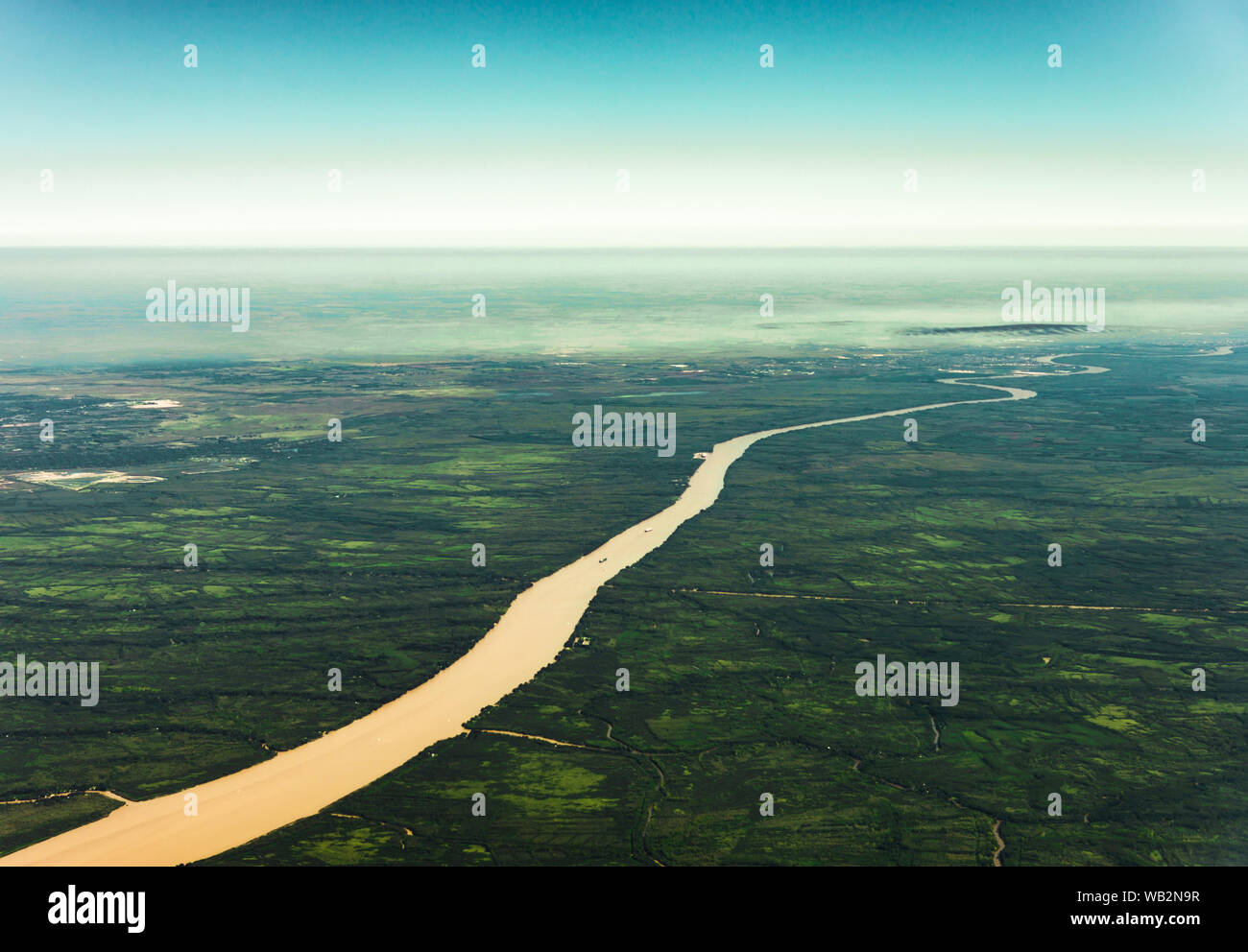 Landscape aerial view of colorful Amazon rivers, forest, jungle, and fields Stock Photo