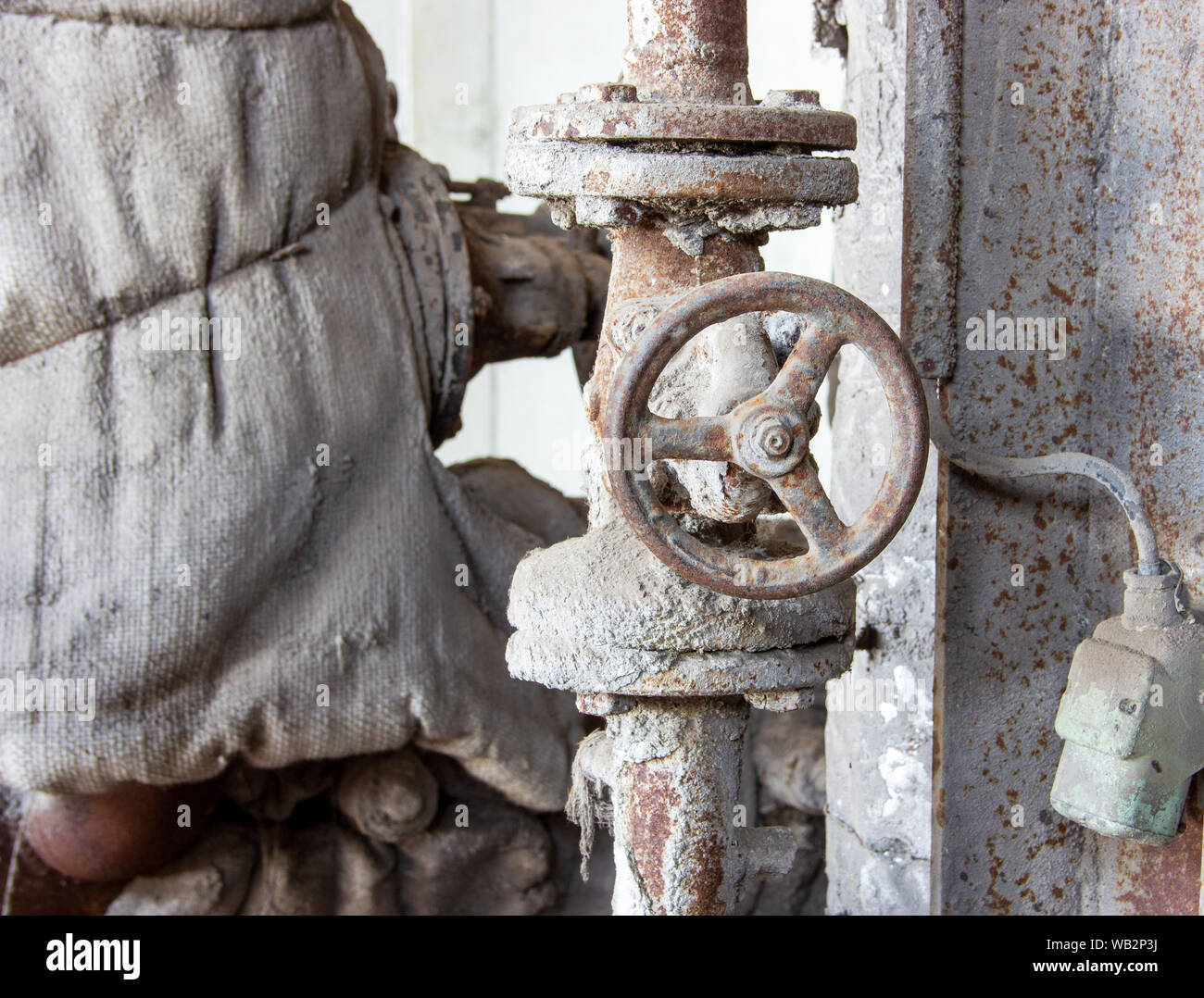 old rusted and oxidized shut-off valve Stock Photo