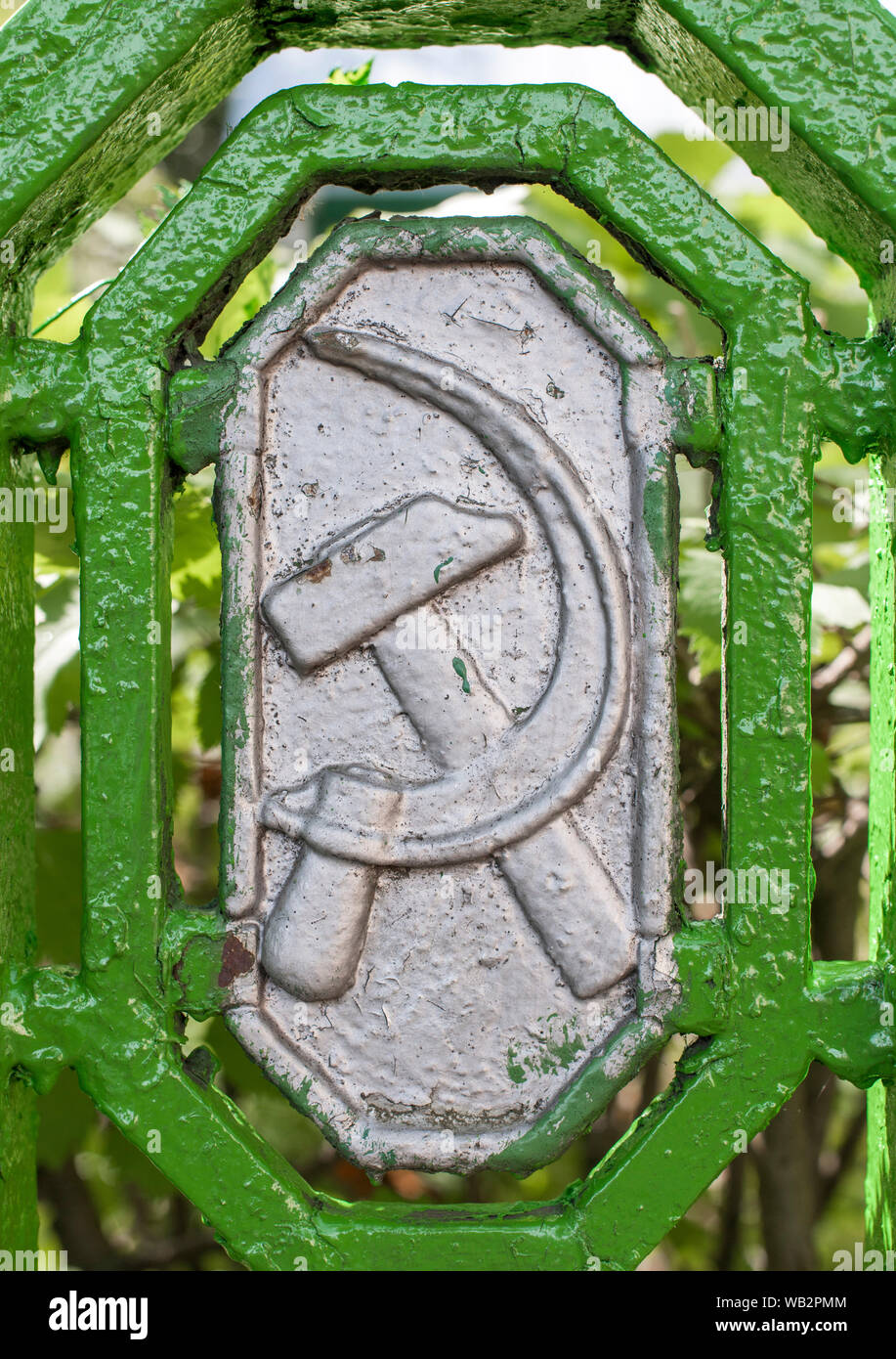 Hammer and sickle emblem on the fence of the House-museum of the 1st Congress of the RSDLP in Minsk, Belarus. Stock Photo