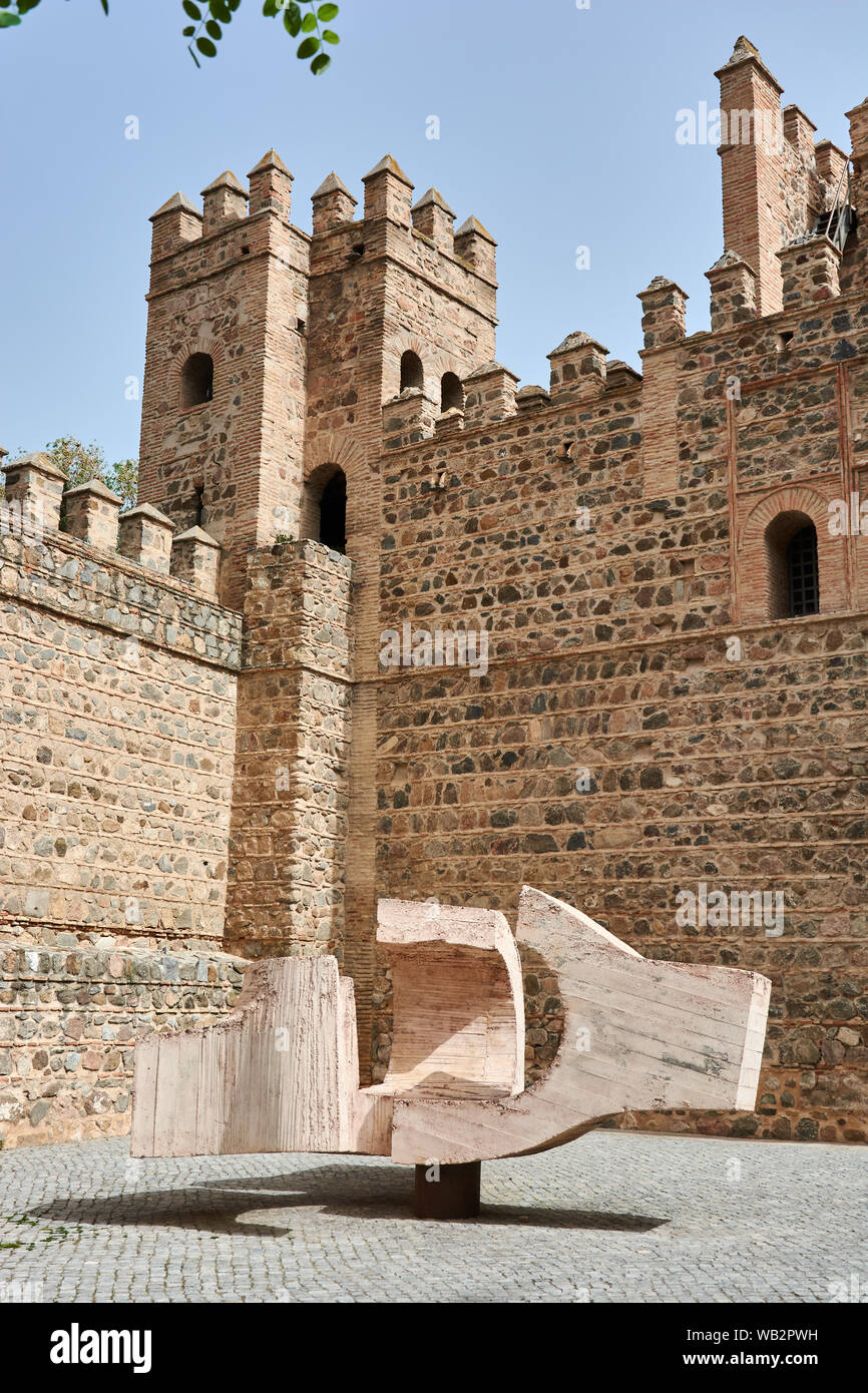 TOLEDO, SPAIN - APRIL 24, 2018: Ancient fortified construction and walls, part of the Old Bisagra Gate or Gate of Alfonso VI, in Toledo. Stock Photo
