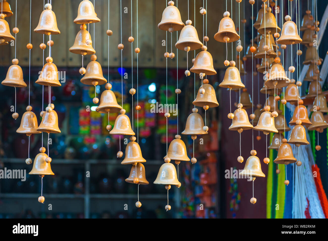 Close-up of woorden bells inside the art and craft market of Masaya, Nicaragua. Stock Photo