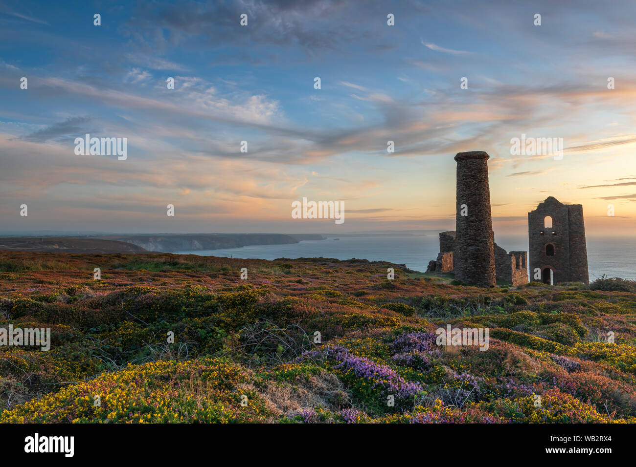 Wheal Coates, near St. Agnes in North Cornwall, England. Monday 23rd August 2019. UK Weather. After a hot and sunny day in Cornwall the wind picks up as the sun sets over Wheal Coates at St. Agnes Beacon at the start of the August Bank Holiday weekend, forecast to be one of the hottest on record; avid fans of the popular BBC One series Poldark will recognise the spectacular scenery as they eagerly await the concluding episodes in the last ever series, screening this Sunday and Monday. Credit: Terry Mathews/Alamy Live News Stock Photo