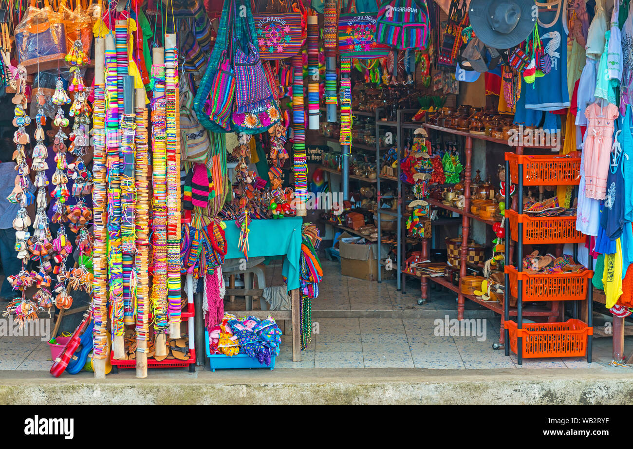 Art and craft shop in the historic city center of Granada with indigenous and traditional textiles as well as other tourism shopping items, Nicaragua. Stock Photo