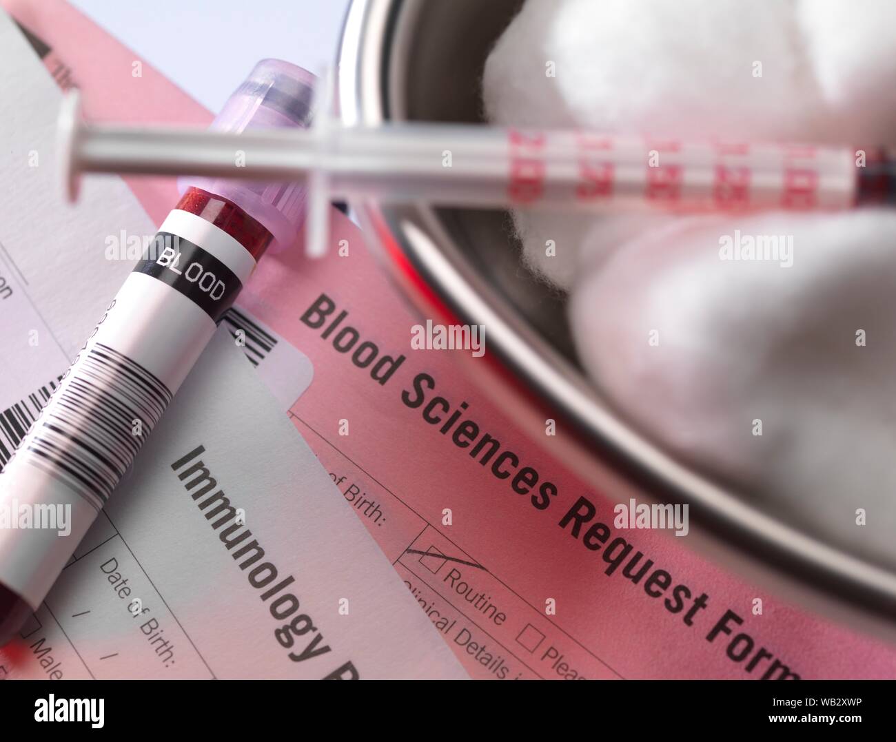 Human blood sample alongside blood test request form Stock Photo Alamy