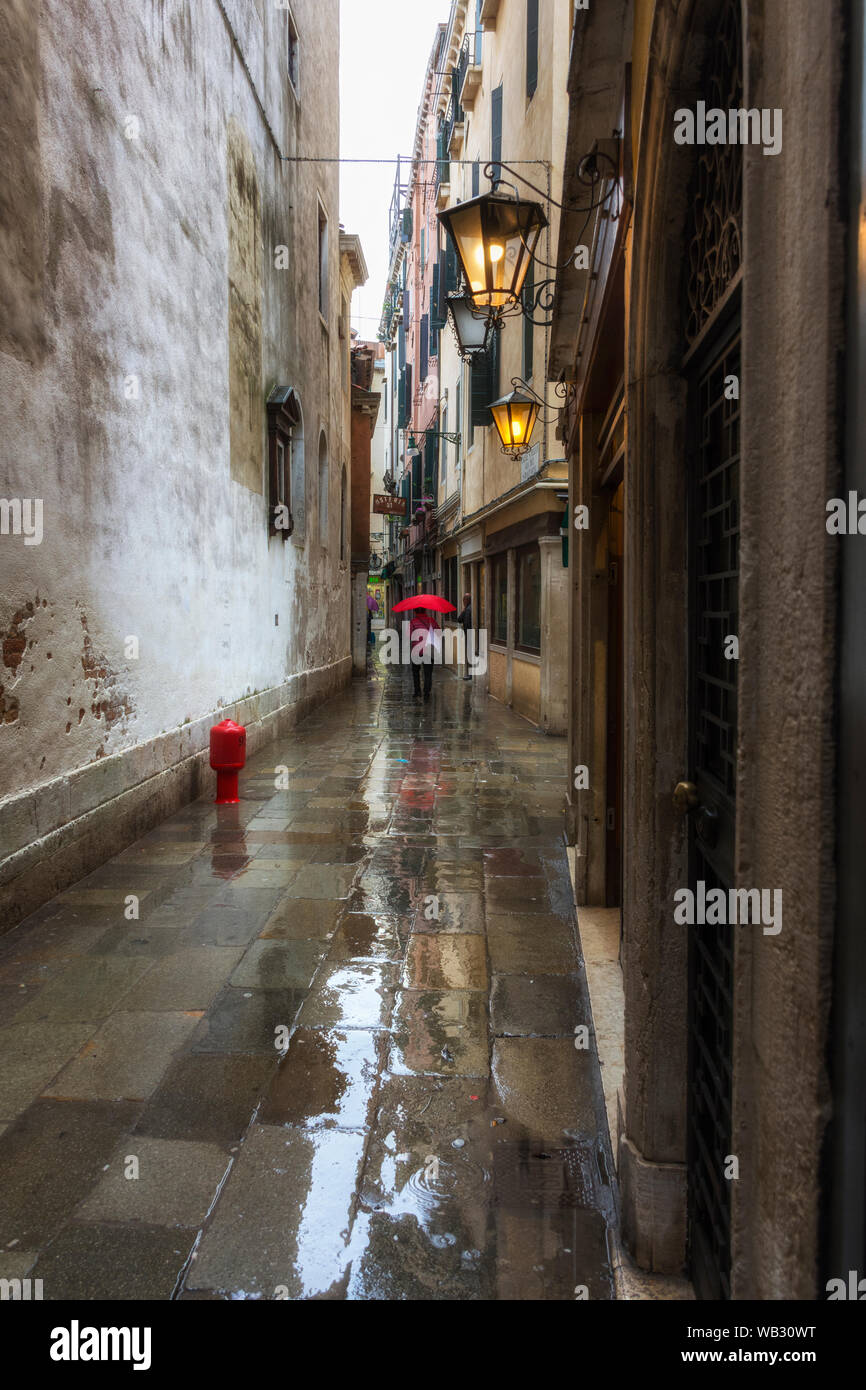 The Calle Spechieri, near the Campo de la Guerra, on a rainy day, Venice, Italy Stock Photo