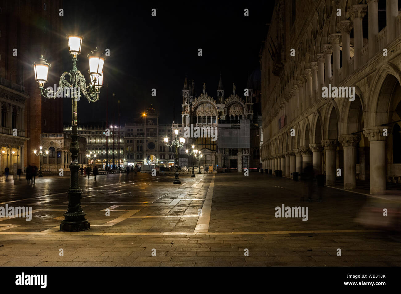 The Piazzetta di San Marco at night, Saint Mark's Square, Venice, Italy.  Doge's Palace at right. Stock Photo