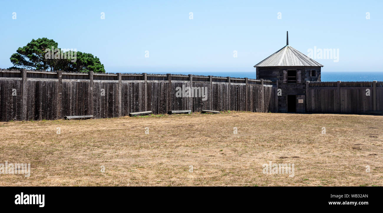 Fort Ross, CA - August 12, 2019: A view of Fort Ross defensive wooden walls and Southeast Blockhouse, located on the US Pacific Coast next to the pres Stock Photo