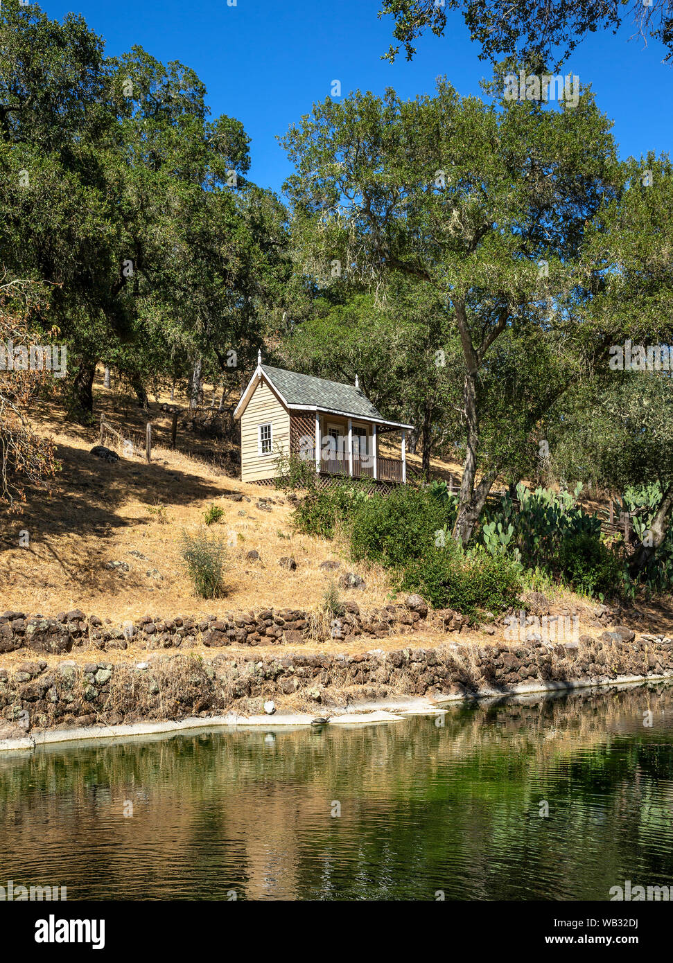 A view of the reservoir and Hermitage or Napoleon’s Cottage at  General Vallejo's Lachryma Montis Estate in Sonoma. The cottage was used by General Va Stock Photo