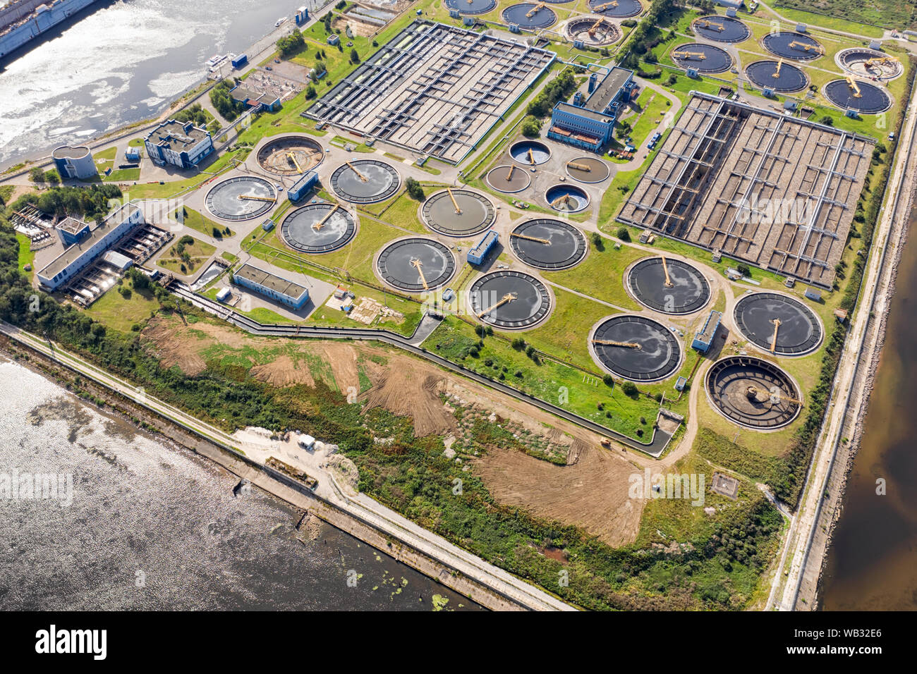 City sewage treatment plant. Cleaning facility on artificial island aerial view Stock Photo