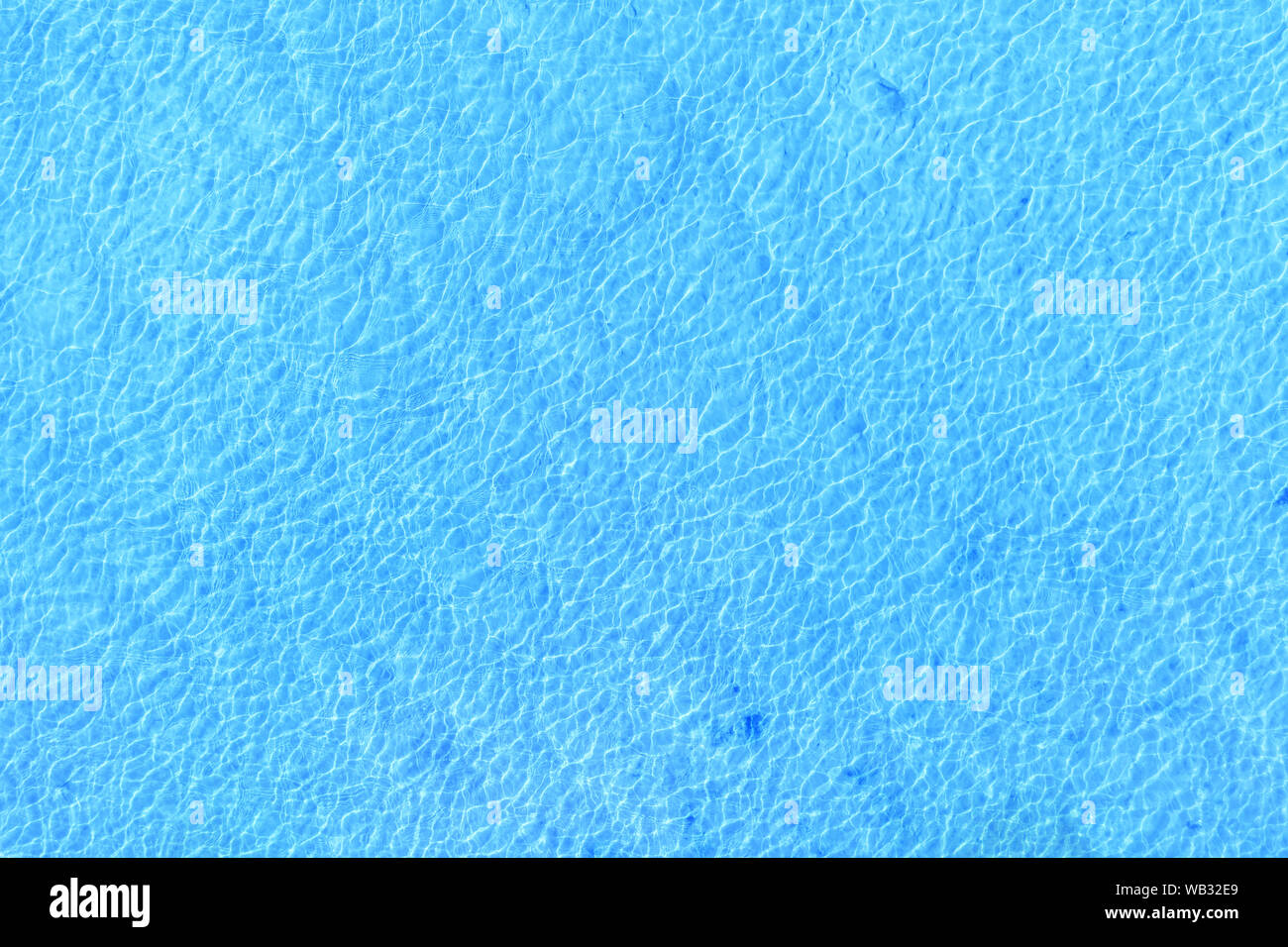 Blue water surface with light waves pattern top view. Texture and background Stock Photo