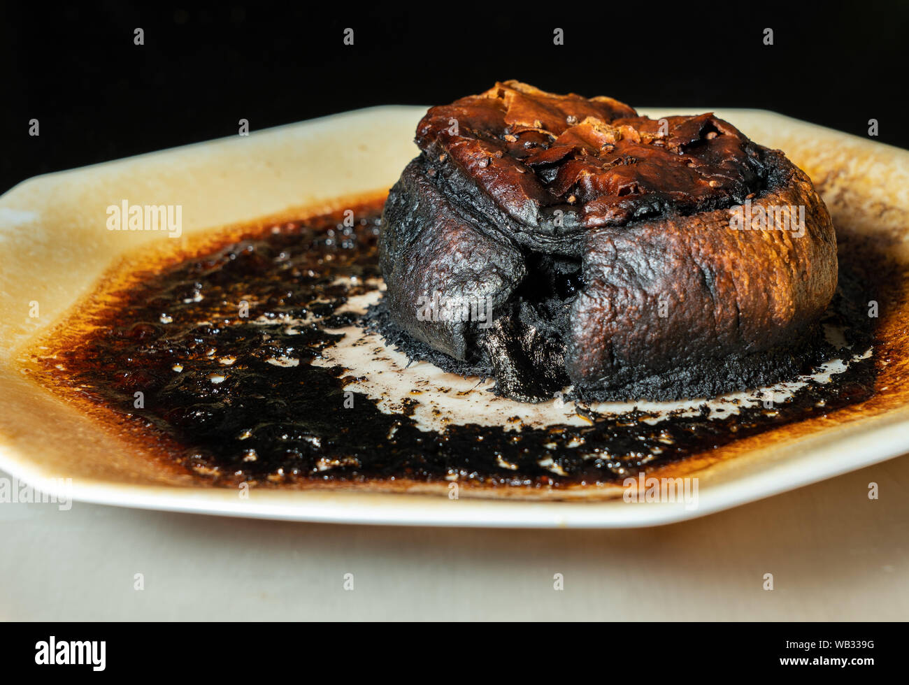 Close Up Of Meat Pie Left Too Long In Microwave Oven Stock Photo Alamy
