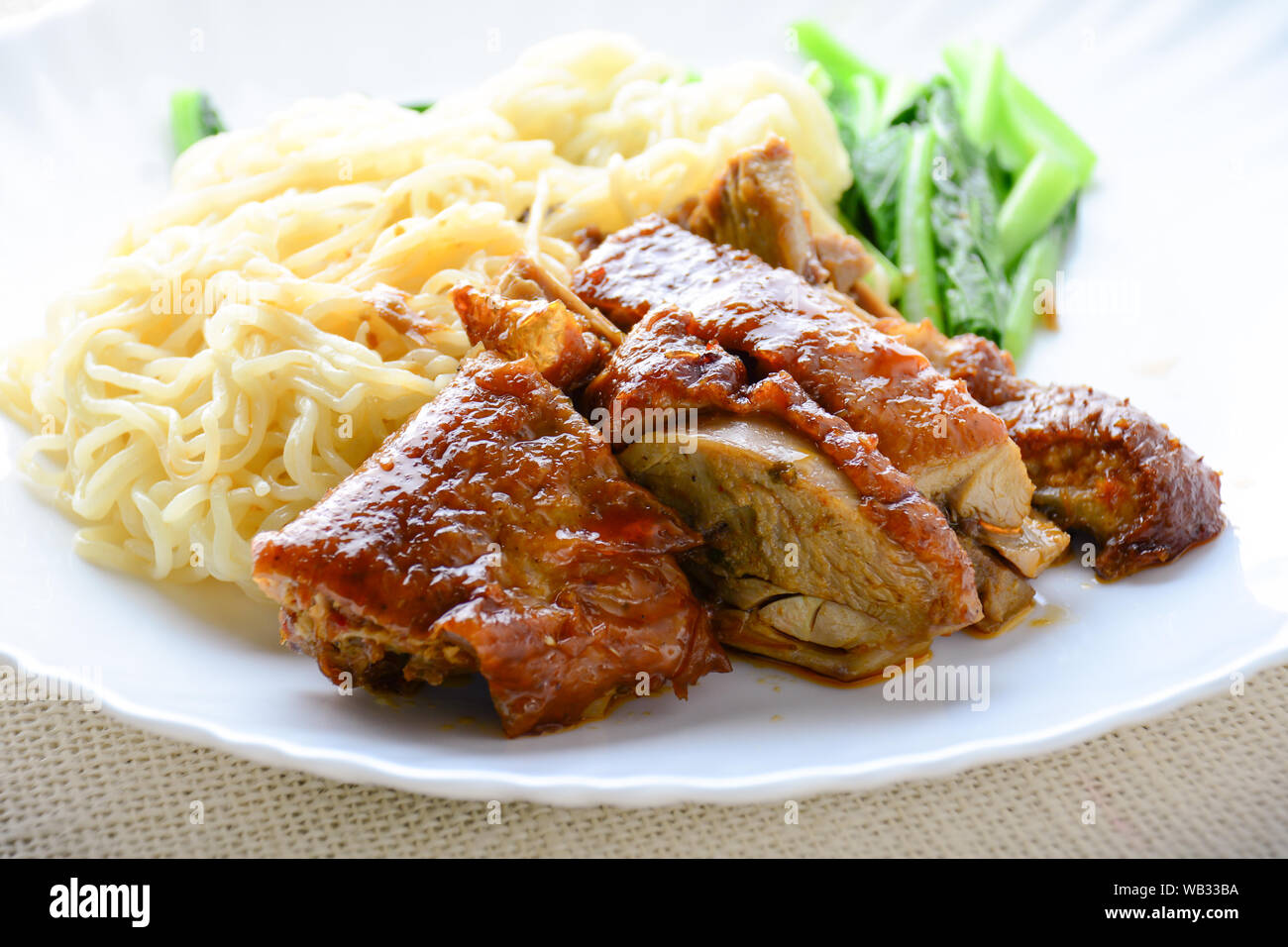 Roast duck with egg noodle Stock Photo