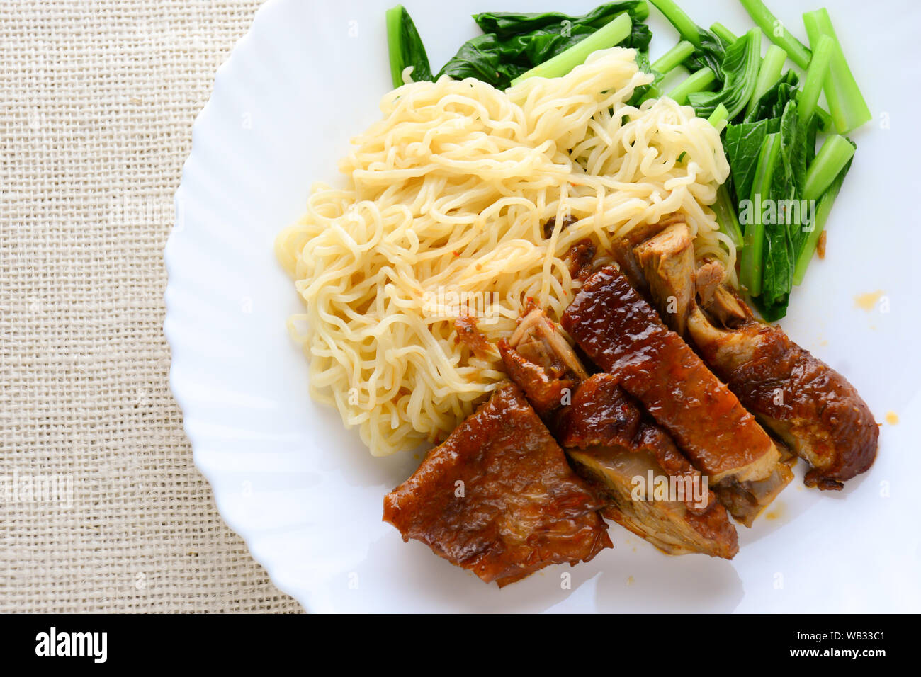 Roast duck with egg noodle Stock Photo Alamy