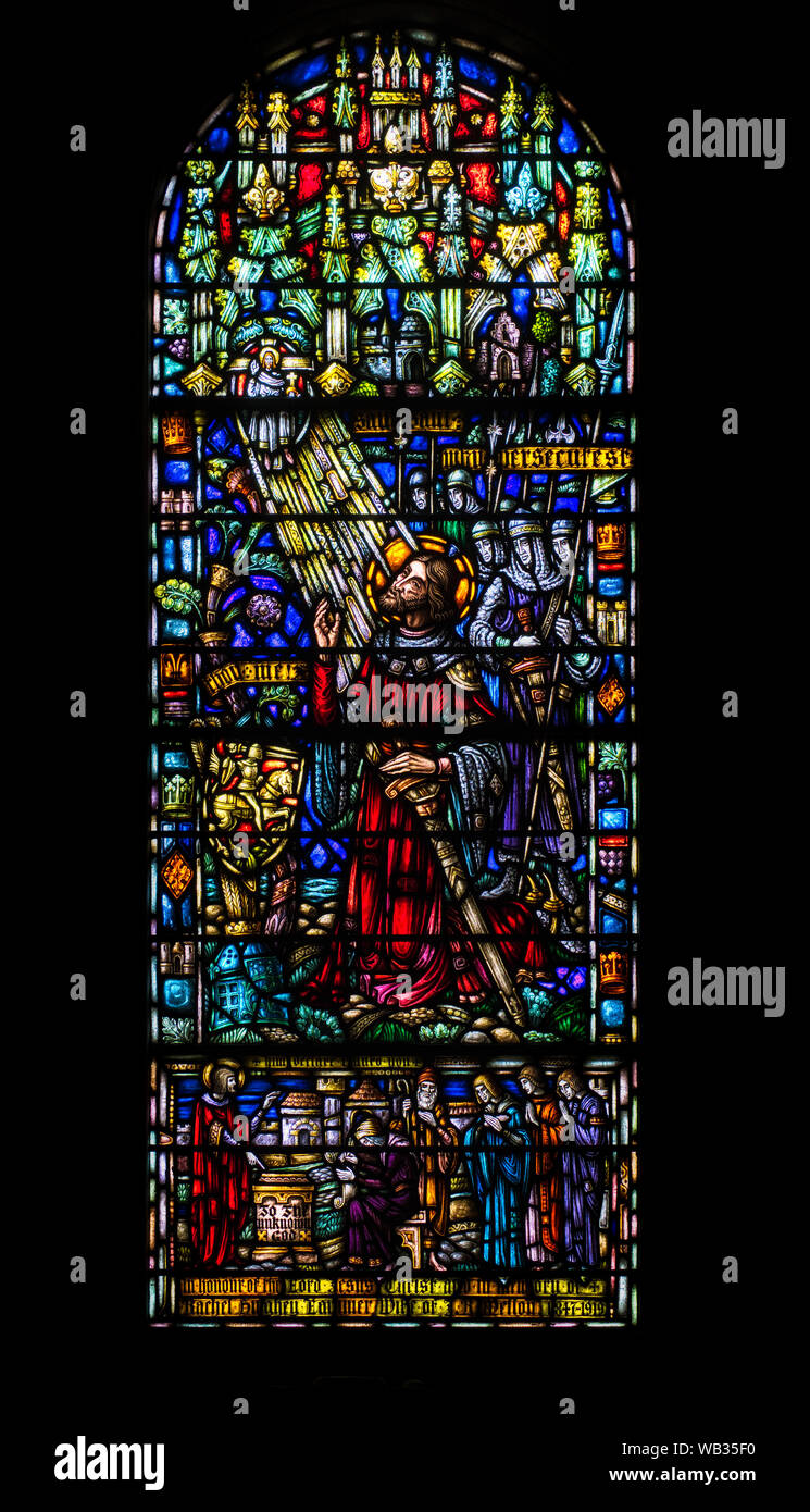 An ornate, colorful stained glass window in the East Liberty