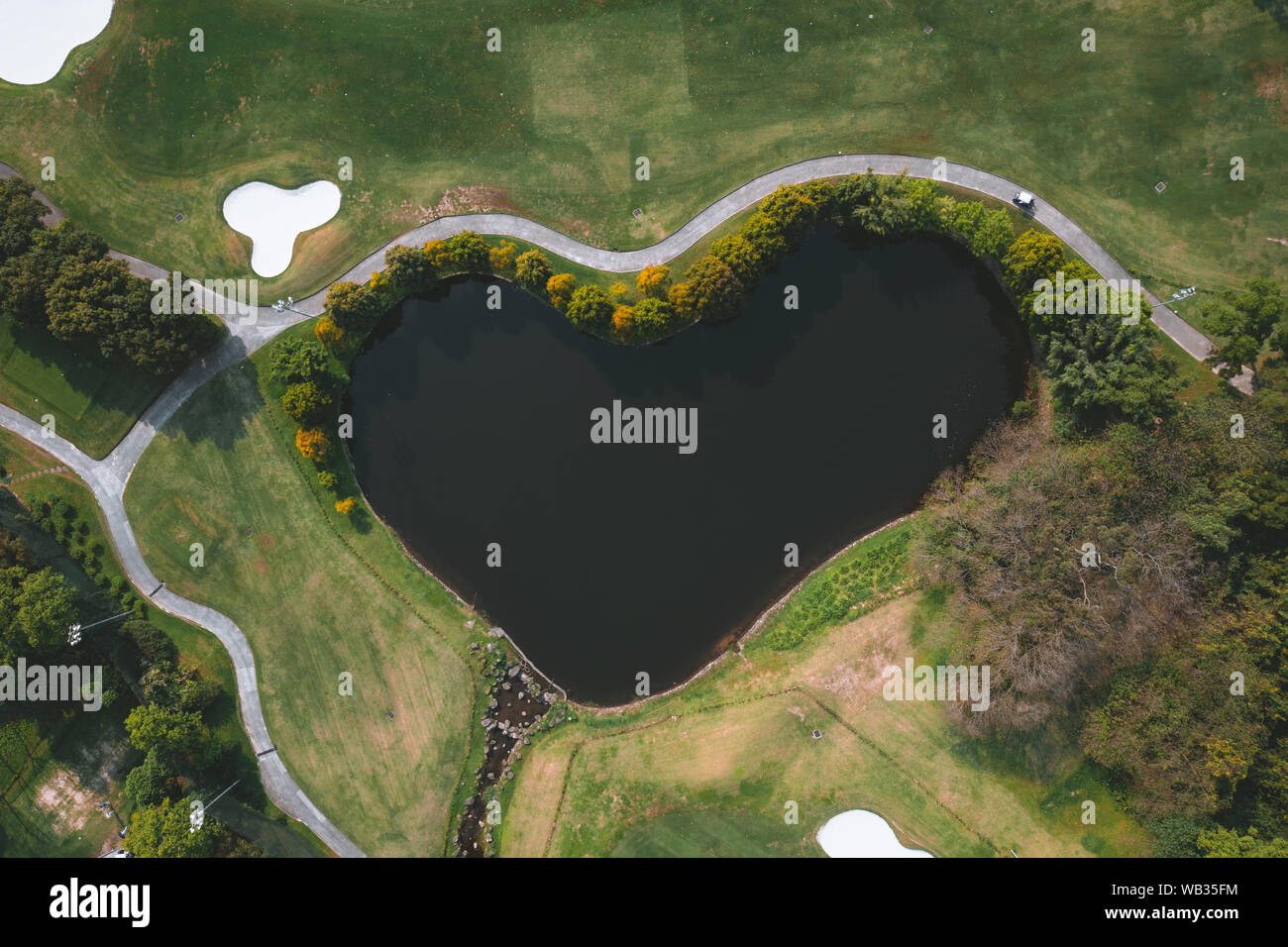heart shape lake golf course Stock Photo Alamy