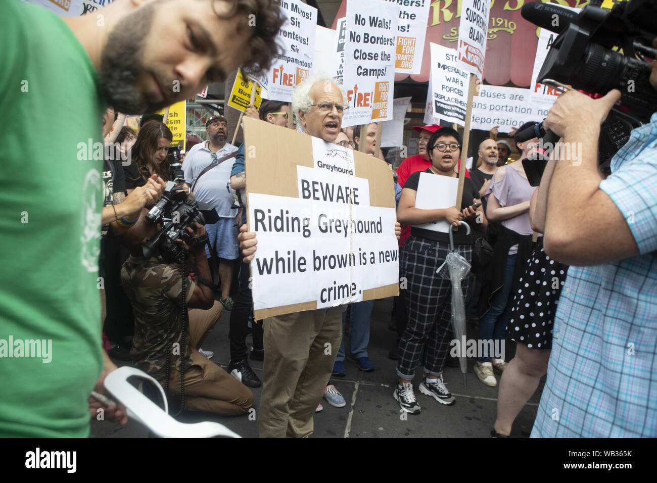 August 23, 2019: A demonstrator is shown protesting against Greyhound Corporation and ICE (Immigration Customs and Enforcement) at the Port Authority Bus Terminal on 42nd and 8th Avenue in New York, New York. About 100 activists from a coalition of groups including FIRE (Fight For Immigrant Refugees Everywhere) protested Greyhound allowing ICE agents to board their busses 'searching for migrants,'' officials said. Credit: Brian Branch Price/ZUMA Wire/Alamy Live News Stock Photo