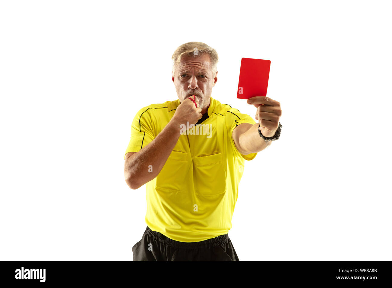 referee showing a red card to a displeased football or soccer player while gaming isolated on white studio background concept of sport rules violation controversial issues obstacles overcoming WB3A8B