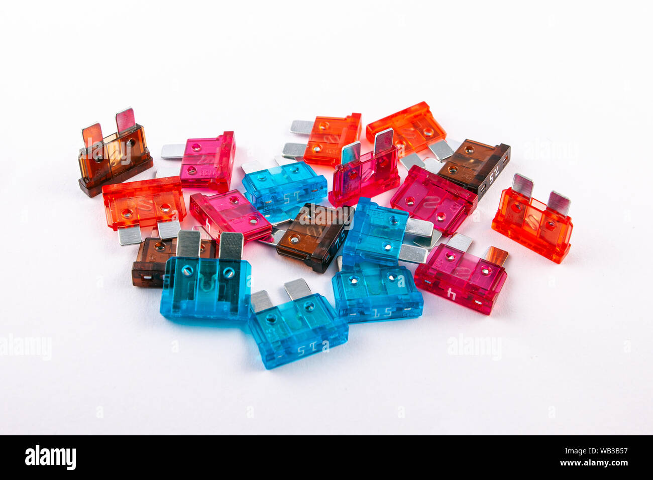 Standard ATO blade fuses with different ampers on isolated white