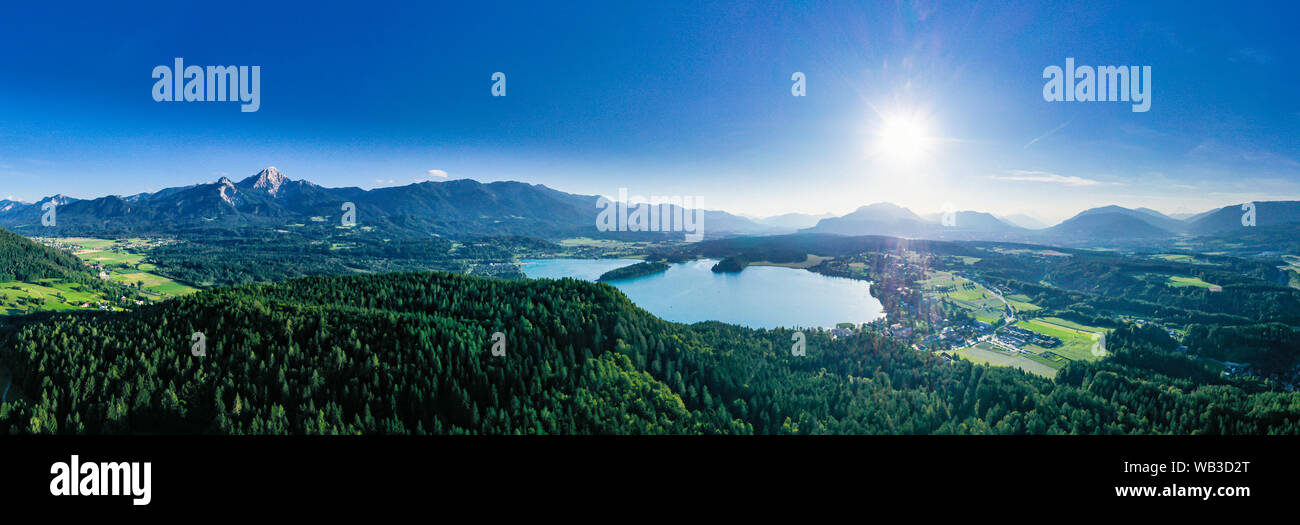 Lake Faaker See and Mittagskogel mountain in Kärnten Carinthia, Austria. Summertime panorama in the beautiful Austrian Alps. Stock Photo