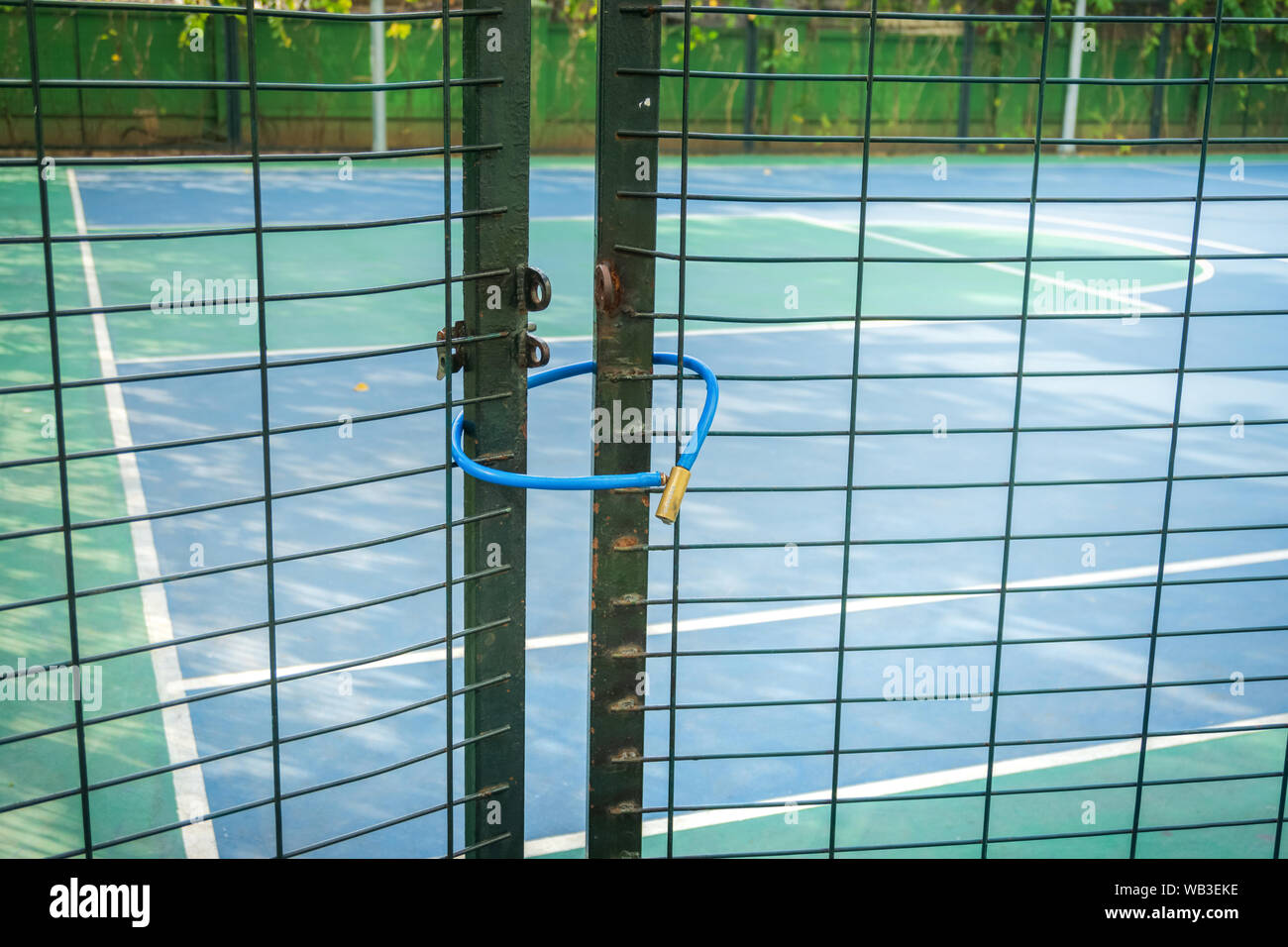 Master Key Lock the door to the tennis court entrance Stock Photo Alamy