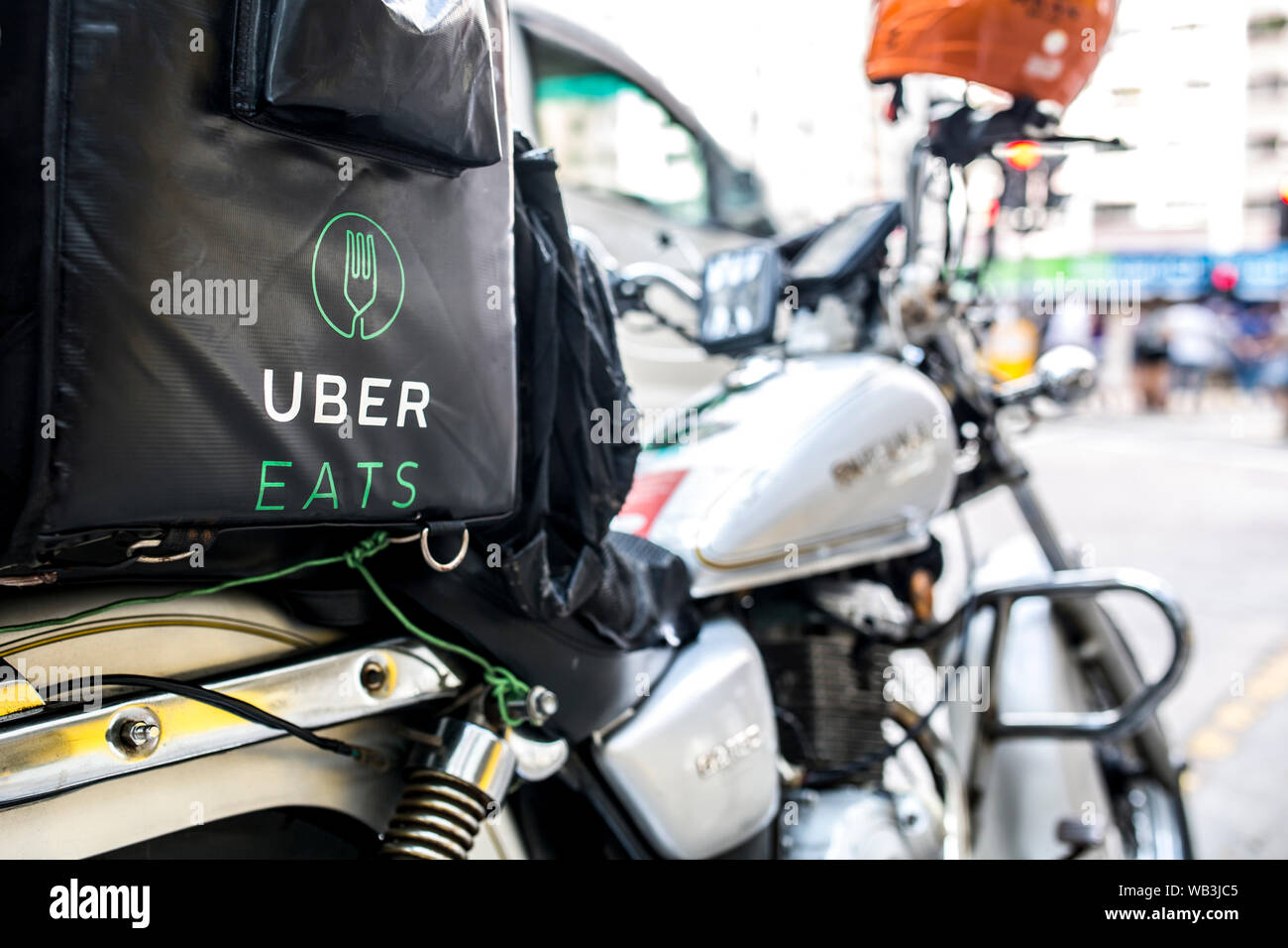 HONG KONG - OCTOBER 18, 2017: An Uber Eats  motorbike parked on the side of the road. Stock Photo