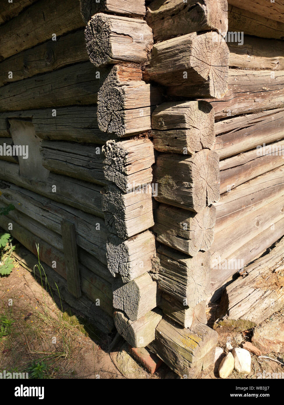 Old historical weathered wooden log house corner Stock Photo
