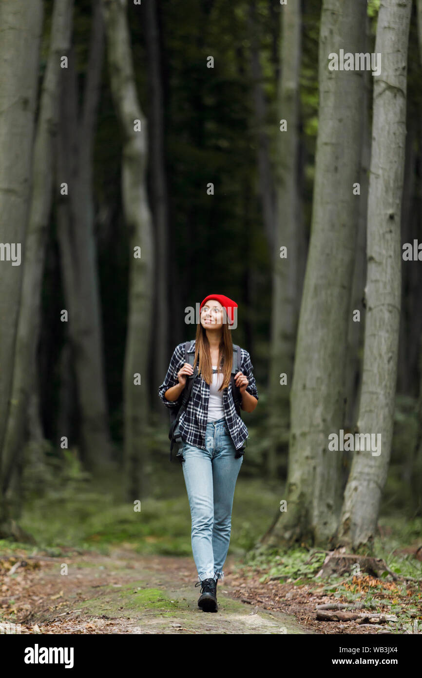 Girl walking alone in forest hi-res stock photography and images - Alamy