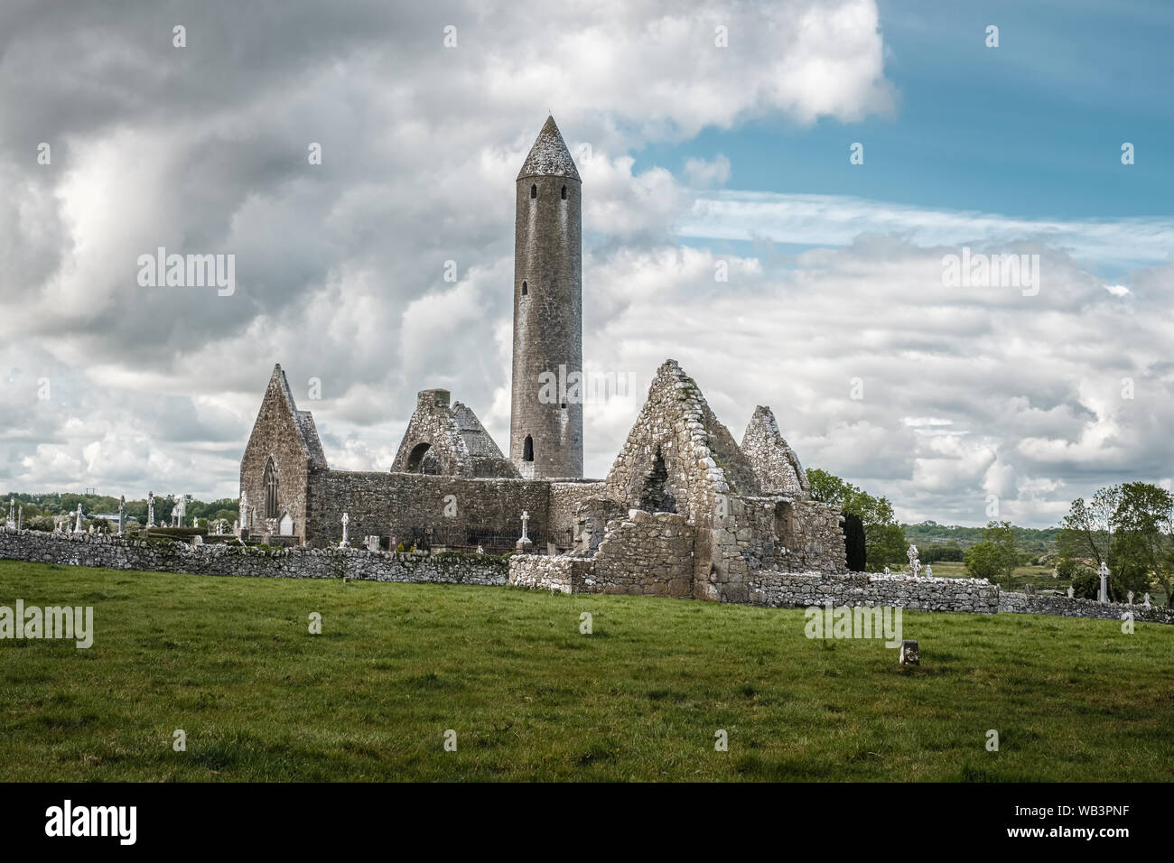 Kilmacduagh Monastery, Nr Gort, County Galway, Ireland - 20th May 2019. The Cathedral and Circular Tower built as a refuge for monks in the 12th centu Stock Photo
