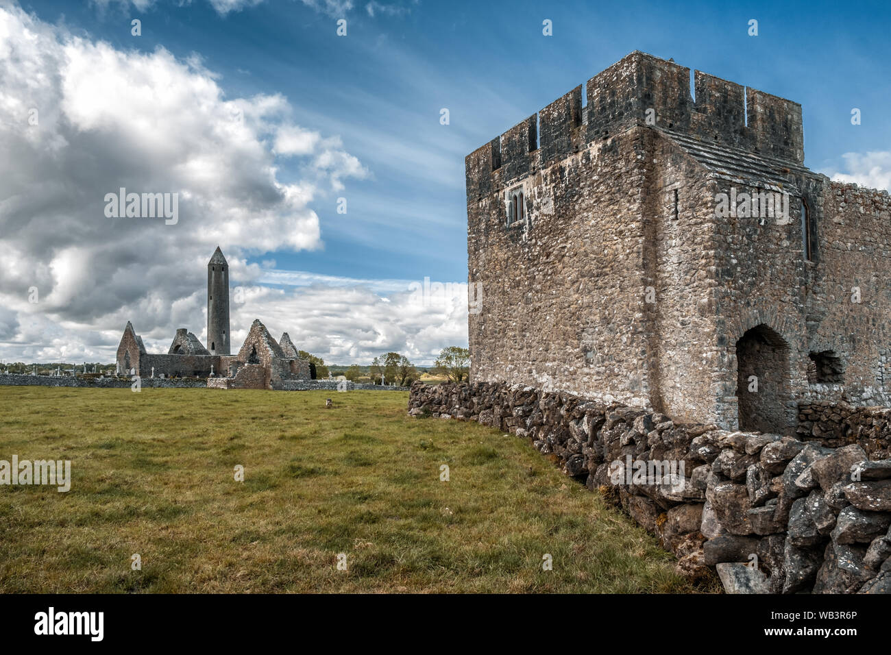 Kilmacduagh Monastery, Nr Gort, County Galway, Ireland - 20th May 2019. Glebe House, built in the 14th century, is part of Kilmacduagh Monastery near Stock Photo