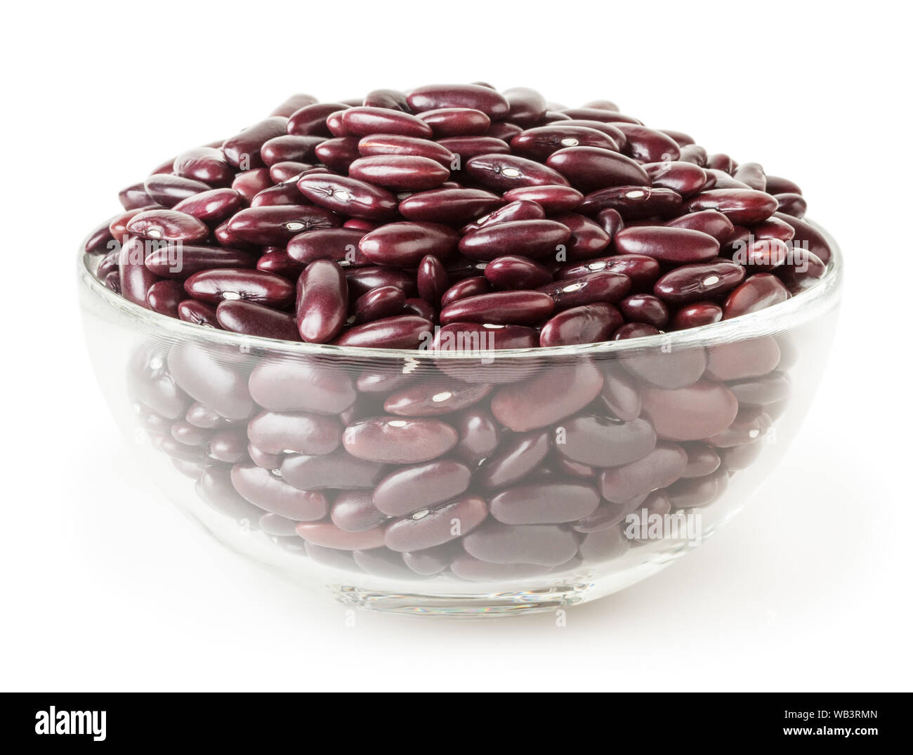 Uncooked red kidney beans in glass bowl isolated on white background