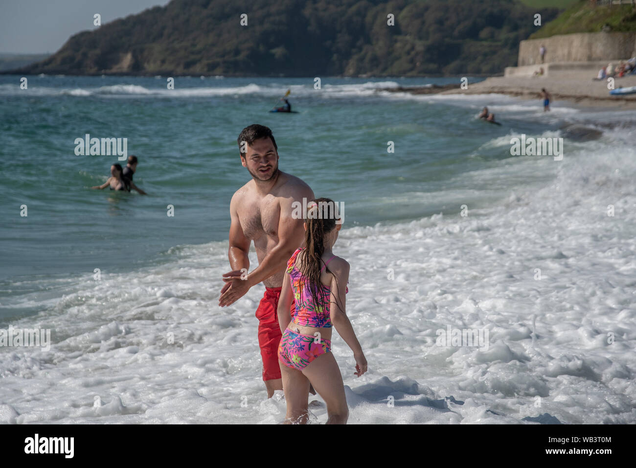 Gyllyngvase beach,Falmouth, Cornwall, UK. 24th August 2019. UK Weather. Freya Wilkes, aged 9, from Kent out on the beach at Falmouth making the most of the bank holiday heatwave. ( parental release obtained)  Credit Simon Maycock / Alamy Live News. Stock Photo