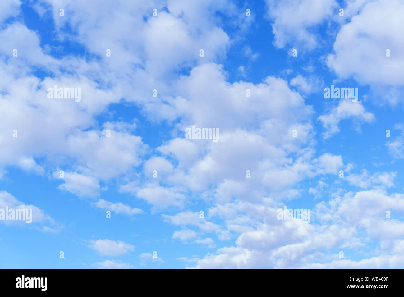 background - bright blue sky with white cumulus clouds Stock Photo - Alamy