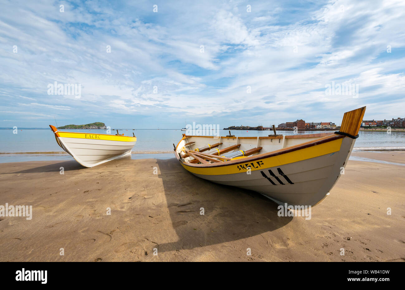 North Berwick, Scotland, UK, 24 August 2019. Colourful rowing skiffs ...