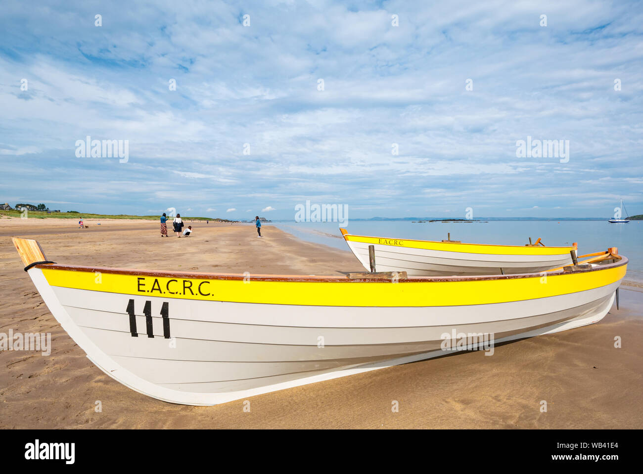 North Berwick, Scotland, UK, 24 August 2019. Colourful rowing skiffs ...
