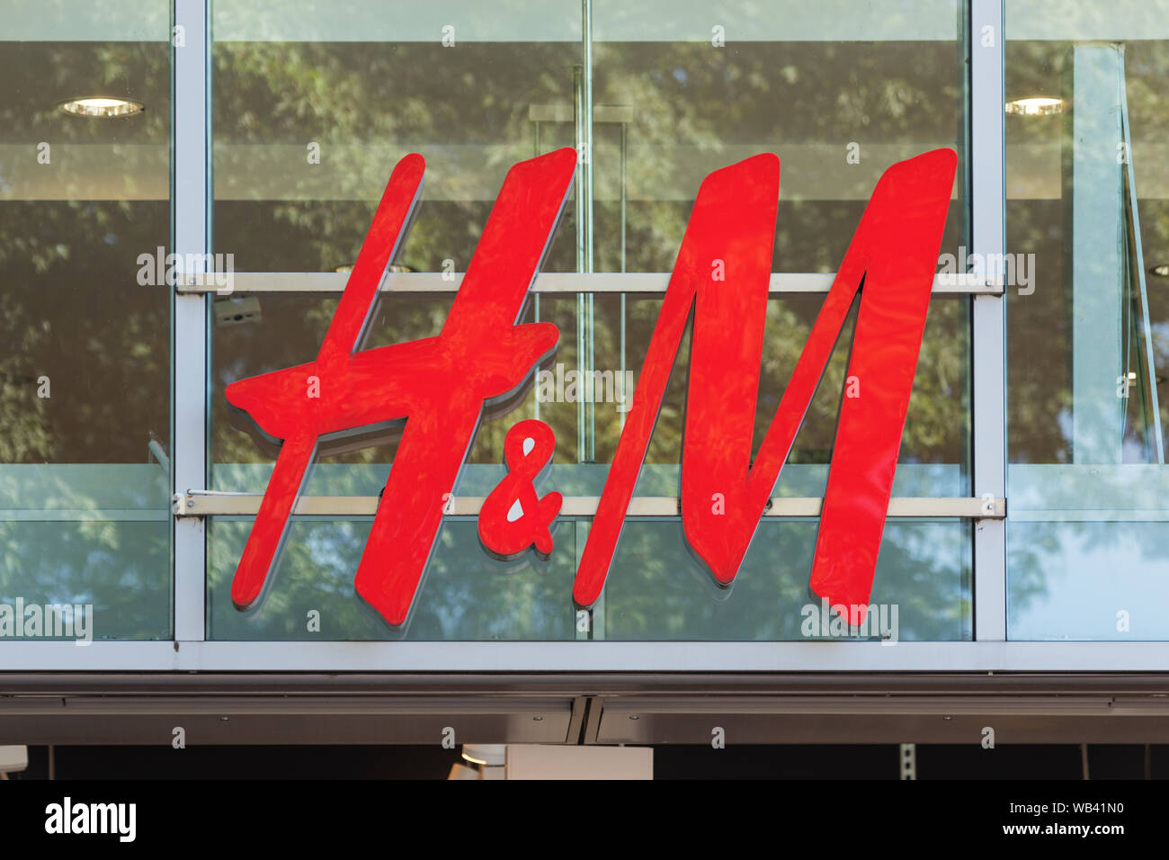Stade, Germany - August 22, 2019: Signage at storefront identifying a H&M  store Stock Photo - Alamy